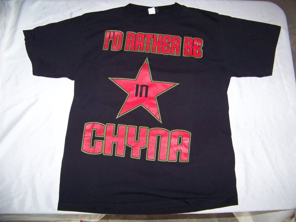 http://i589.photobucket.com/albums/ss332/everything80s/other%20collectables/tshirt_wwf_chyna1.jpg