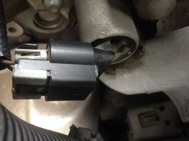 How do I disconnect wiring harness from camshaft actuator solenoid